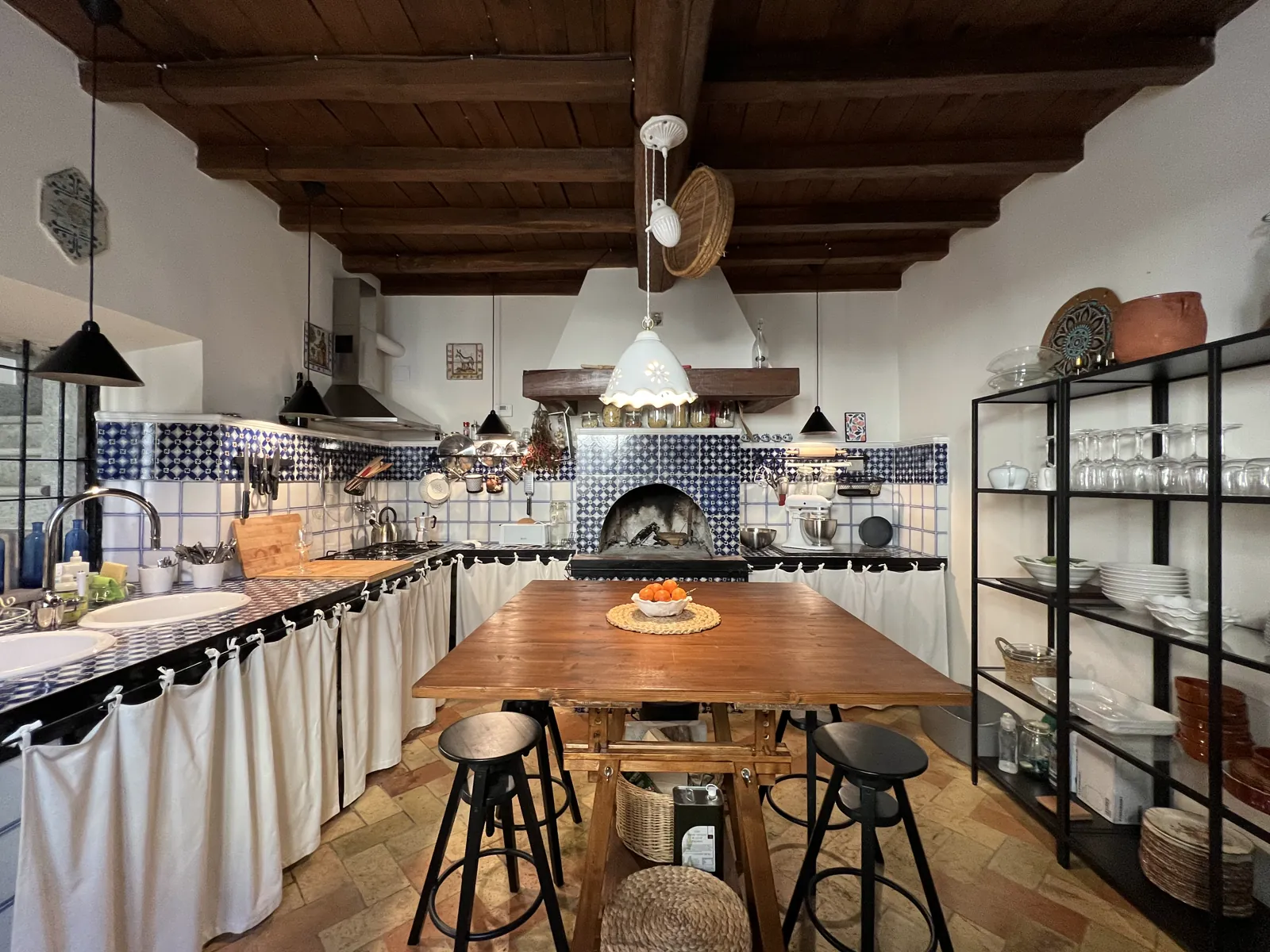 Kitchen table by the wood-fired oven